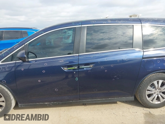 2015 Honda Odyssey EX-L z VIN 5FNRL5H62FB008681, wystawiony jako IAAI lot #42060381 z przebiegiem 128 372 mil mil oraz . Historia ofert i sprzedaży dostępna na DreamBid. Obrazek 14.