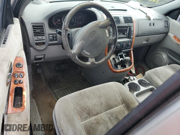2004 Kia Sedona LX with VIN KNDUP131446570061, listed as a Copart auction lot 74222344 with 0 mi miles and Salvage Title. Bid and sale history available at carsss.com. Image 8.