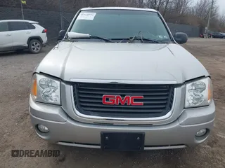 2004 GMC Envoy SLE with VIN 1GKDT13S142219365, listed as a IAAI auction lot 41612594 with 72,292 mi miles. Bid and sale history available at carsss.com. Image 6.