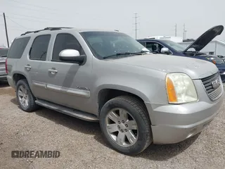 2007 GMC Yukon SLT with VIN 1GKFK13007J115065, listed as a IAAI auction lot 41837778 with 234,917 mi miles. Bid and sale history available at carsss.com. Image 1.