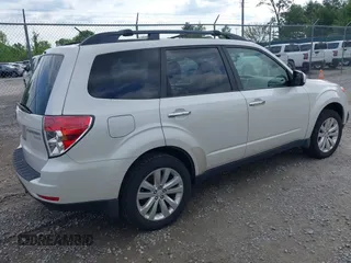 2013 Subaru Forester X Limited with VIN JF2SHAEC9DH401677, listed as a IAAI auction lot 42072338 with 288,909 mi miles and . Bid and sale history available at DreamBid. Image 4.