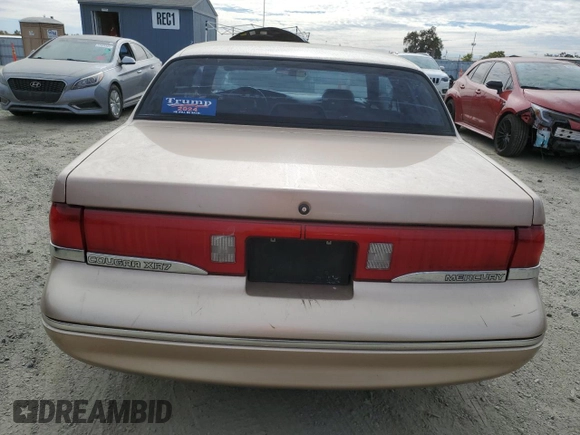 1996 Mercury Cougar z VIN 1MELM62W3TH600523, wystawiony jako Copart lot #78253454 z przebiegiem 84 531 mil mil oraz Tytuł czysty. Historia ofert i sprzedaży dostępna na DreamBid. Obrazek 6.