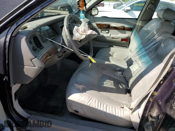 1999 Mercury Grand Marquis LS z VIN 2MEFM75W1XX635839, wystawiony jako Copart lot #55860735 z przebiegiem 114 963 mil mil oraz Szkoda całkowita • Salvage title. Historia ofert i sprzedaży dostępna na DreamBid. Obrazek 7.