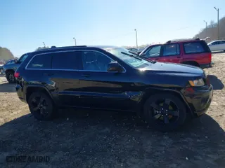 2015 Jeep Grand Cherokee Altitude with VIN 1C4RJFAG1FC628336, listed as a IAAI auction lot 41654598 with 187,359 mi miles. Bid and sale history available at carsss.com. Image 13.