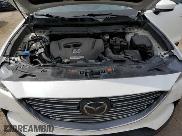 2021 Mazda CX-9 Touring with VIN JM3TCBCY4M0524573, listed as a Copart auction lot 60961165 with 58,408 mi miles and Salvage title. Bid and sale history available at DreamBid. Image 12.