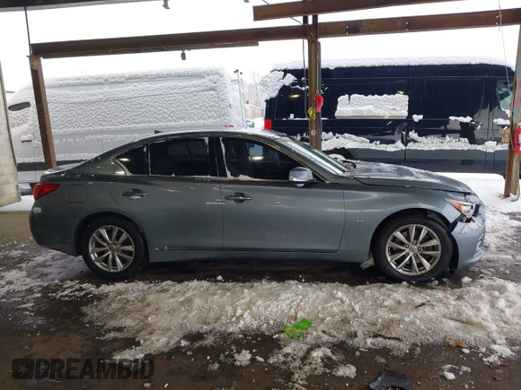 2015 Infiniti Q50 Premium with VIN JN1BV7AR4FM399046, listed as a IAAI auction lot 41560885 with 143,488 mi miles and . Bid and sale history available at DreamBid. Image 13.