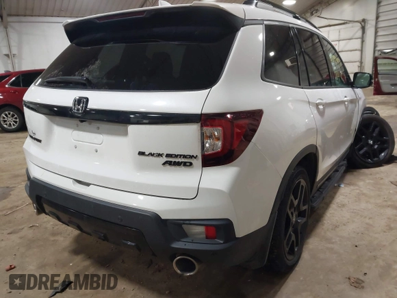2024 Honda Passport Black Edition with VIN 5FNYF8H86RB001825, listed as a IAAI auction lot 41019497 with 15,884 mi miles and . Bid and sale history available at DreamBid. Image 4.