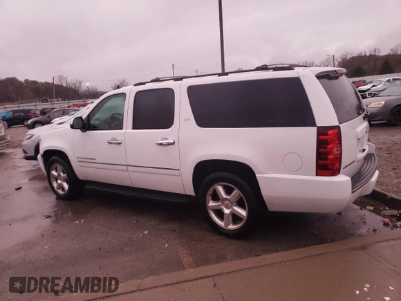 2009 Chevrolet Suburban LTZ with VIN 1GNFC36019J122990, listed as a Copart auction lot 79067174 with 167,632 mi miles and Salvage title. Bid and sale history available at DreamBid. Image 2.