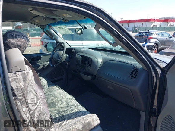 2003 Ford F-150 XL with VIN 1FTRX17L33NB61748, listed as a IAAI auction lot 41789730 with 301,092 mi miles. Bid and sale history available at carsss.com. Image 5.