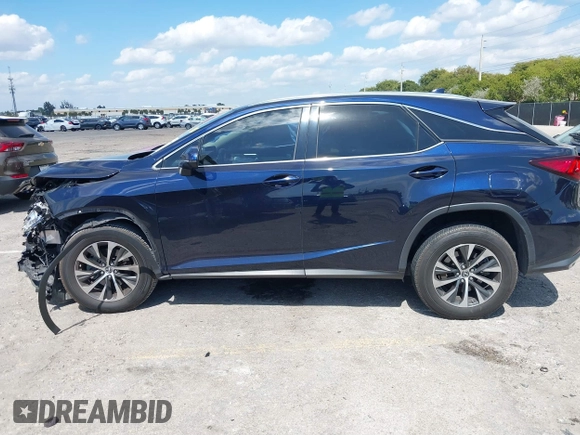 2020 Lexus RX with VIN 2T2AZMAA8LC177233, listed as a IAAI auction lot 41708568 with 62,778 mi miles. Bid and sale history available at carsss.com. Image 14.