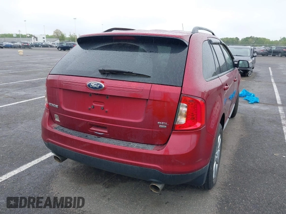 2014 Ford Edge SEL z VIN 2FMDK4JC2EBB09752, wystawiony jako IAAI lot #42180224 z przebiegiem 107 503 mil mil oraz . Historia ofert i sprzedaży dostępna na DreamBid. Obrazek 4.
