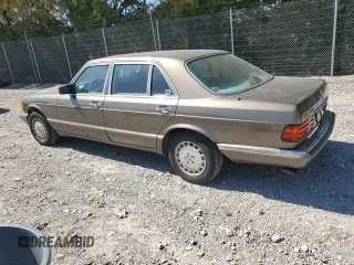 1987 Mercedes-Benz 420 with VIN WDBCA35D0HA311262, listed as a Copart auction lot 71760554 with 185,520 mi miles and Salvage Title. Bid and sale history available at carsss.com. Image 2.