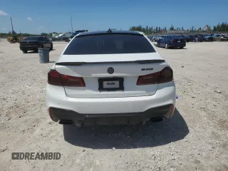 2018 BMW 5 Series 540i with VIN WBAJE5C58JWA96615, listed as a Copart auction lot 56117205 with 87,211 mi miles and Salvage title. Bid and sale history available at DreamBid. Image 6.