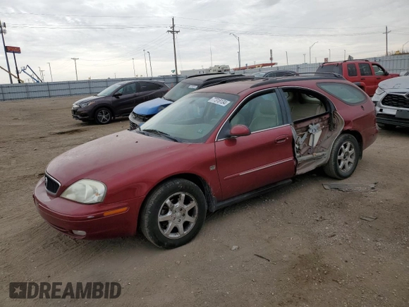 2002 Mercury Sable LS Premium z VIN 1MEFM59S52A640037, wystawiony jako Copart lot #77318134 z przebiegiem 137 836 mil mil oraz Szkody całkowita. Historia ofert i sprzedaży dostępna na DreamBid. Obrazek 1.