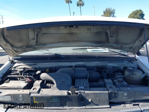 2006 Ford Econoline Cargo with VIN 1FTRE14W46HA46504, listed as a IAAI auction lot 41381776 with 251,238 mi miles and . Bid and sale history available at DreamBid. Image 10.