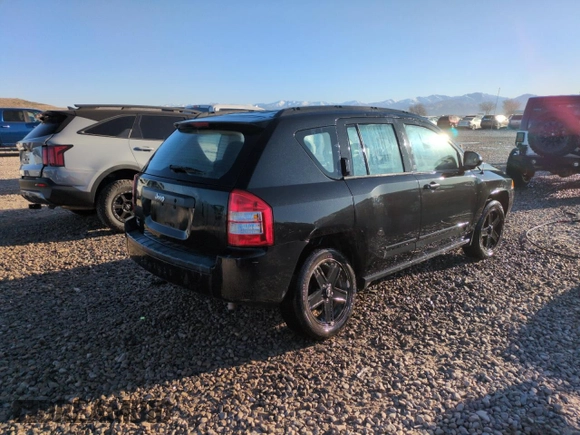 2009 Jeep Compass North with VIN 1J4FT47B89D189562, listed as a Copart auction lot 48285415 with 89,377 mi miles and Salvage Title. Bid and sale history available at carsss.com. Image 3.