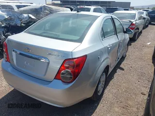 2014 Chevrolet Sonic LT with VIN 1G1JC5SH1E4229324, listed as a IAAI auction lot 39945012 with Not Provided miles and . Bid and sale history available at DreamBid. Image 4.