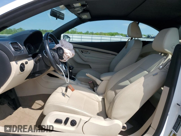 2011 Volkswagen Eos with VIN WVWAW7AH7BV003659, listed as a Copart auction lot 52494904 with 122,927 mi miles and Salvage Title. Bid and sale history available at DreamBid. Image 7.