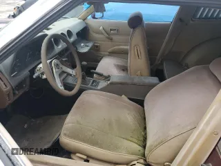 1981 Datsun 280ZX 2+2 z VIN JN1HZ06S3BX408927, wystawiony jako Copart lot #43963805 z przebiegiem 169 783 mil mil oraz Tytuł czysty. Historia ofert i sprzedaży dostępna na DreamBid. Obrazek 7.