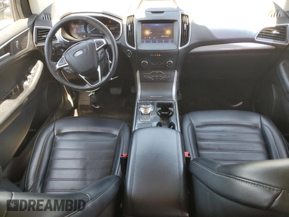 2020 Ford Edge SEL с VIN 2FMPK4J94LBA81516, выставлен на аукционе Copart как лот 56176725 с пробегом 129 952 миль миль и Списание • Salvage title. История ставок и продаж доступна на DreamBid. Изображение 8.