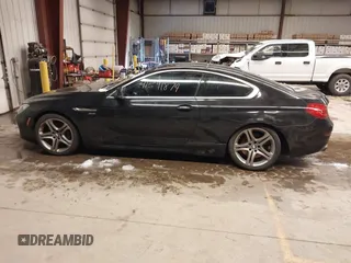 2012 BMW 6 Series 650i xDrive with VIN WBALX5C57CC894205, listed as a IAAI auction lot 41591874 with 110,932 mi miles. Bid and sale history available at carsss.com. Image 14.