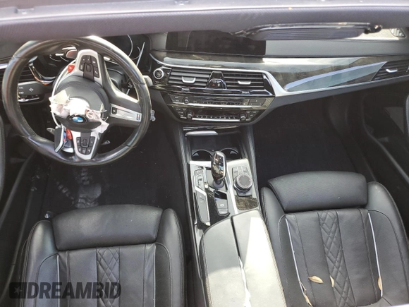 2018 BMW 5 Series M550i xDrive with VIN WBAJB9C53JB034947, listed as a Copart auction lot 77270534 with Not provided miles and Non repairable. Bid and sale history available at DreamBid. Image 8.