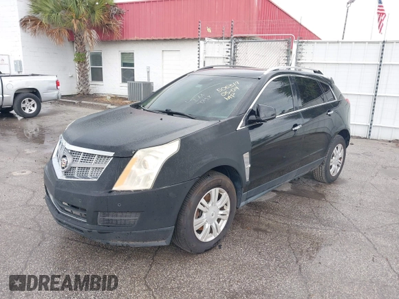 2012 Cadillac SRX Luxury Collection z VIN 3GYFNAE39CS505319, wystawiony jako IAAI lot #42240143 z przebiegiem 215 376 mil mil oraz . Historia ofert i sprzedaży dostępna na DreamBid. Obrazek 2.
