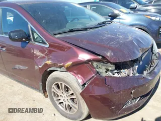 2013 Honda Odyssey EX-L with VIN 5FNRL5H61DB017398, listed as a IAAI auction lot 41689227 with 159,361 mi miles and . Bid and sale history available at carsss.com. Image 6.