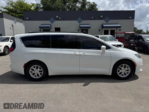 2020 Chrysler Voyager LXI with VIN 2C4RC1DG9LR144605, listed as a Copart auction lot 54107585 with 140,575 mi miles and Salvage Title. Bid and sale history available at carsss.com. Image 13.