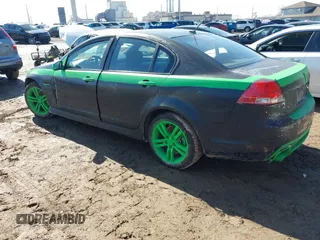 2009 Pontiac G8 with VIN 6G2ER57739L172831, listed as a IAAI auction lot 41662818 with 145,900 mi miles. Bid and sale history available at carsss.com. Image 3.