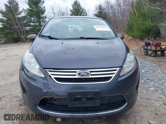 2012 Ford Fiesta SE with VIN 3FADP4BJ3CM152310, listed as a IAAI auction lot 42028398 with 124,530 mi miles and . Bid and sale history available at DreamBid. Image 12.