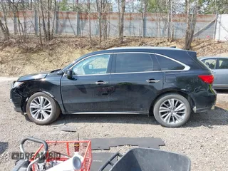 2018 Acura MDX Technology with VIN 5J8YD4H59JL005102, listed as a IAAI auction lot 42155562 with 71,890 mi miles and . Bid and sale history available at DreamBid. Image 14.