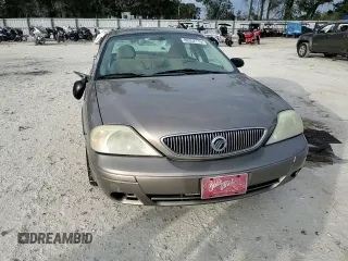 2004 Mercury Sable GS z VIN 1MEFM50U24A617431, wystawiony jako Copart lot #88352715 z przebiegiem 141 457 mil mil oraz Szkody całkowita. Historia ofert i sprzedaży dostępna na DreamBid. Obrazek 11.
