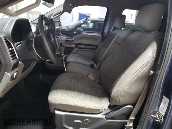 2015 Ford F-150 XLT with VIN 1FTEW1EP2FKE74996, listed as a Copart auction lot 62384295 with 125,469 mi miles and Clean title. Bid and sale history available at DreamBid. Image 7.