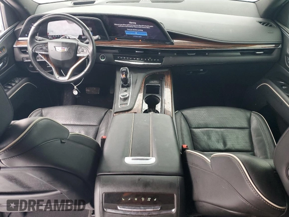 2021 Cadillac Escalade Premium Luxury with VIN 1GYS4BKL4MR414197, listed as a Copart auction lot 88093605 with 63,196 mi miles and Salvage title. Bid and sale history available at DreamBid. Image 8.