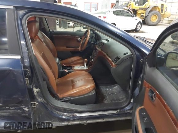 2009 Saturn Aura XR with VIN 1G8ZX57769F186330, listed as a IAAI auction lot 41990321 with 167,848 mi miles and . Bid and sale history available at DreamBid. Image 5.