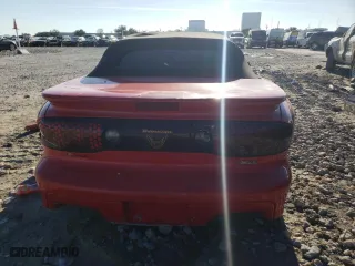 2000 Pontiac Firebird Trans Am with VIN 2G2FV32G3Y2160590, listed as a Copart auction lot 84537914 with 0 mi miles and Salvage Title. Bid and sale history available at carsss.com. Image 6.