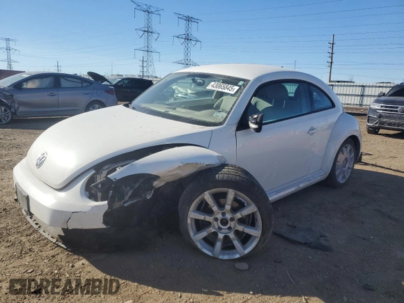 2012 Volkswagen Beetle 2.5L w/Sound/Nav PZEV with VIN 3VWJP7AT4CM657836, listed as a Copart auction lot 43065845 with 96,854 mi miles and Salvage Title. Bid and sale history available at DreamBid. Image 1.