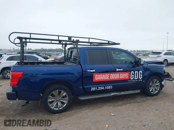 2018 Nissan Titan SV with VIN 1N6AA1E69JN500096, listed as a IAAI auction lot 41883390 with 136,752 mi miles and . Bid and sale history available at DreamBid. Image 14.