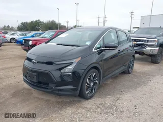 2023 Chevrolet Bolt EV 2LT with VIN 1G1FX6S02P4143467, listed as a IAAI auction lot 41607322 with 95,398 mi miles. Bid and sale history available at carsss.com. Image 2.