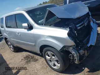 2013 Honda Pilot EX-L with VIN 5FNYF3H59DB022797, listed as a IAAI auction lot 41880675 with 206,359 mi miles and . Bid and sale history available at DreamBid. Image 1.