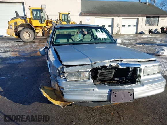 1997 Lincoln Town Car Cartier with VIN 1LNLM83W9VY661126, listed as a IAAI auction lot 41456847 with 160,710 mi miles and . Bid and sale history available at DreamBid. Image 6.