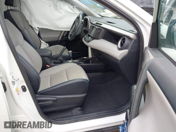 2016 Toyota RAV4 Limited with VIN 2T3YFREV6GW293418, listed as a IAAI auction lot 42367428 with 210,000 mi miles and . Bid and sale history available at DreamBid. Image 5.