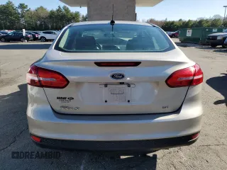 2018 Ford Focus SE with VIN 1FADP3F23JL219189, listed as a Copart auction lot 52209335 with 101,180 mi miles and Salvage title. Bid and sale history available at DreamBid. Image 6.
