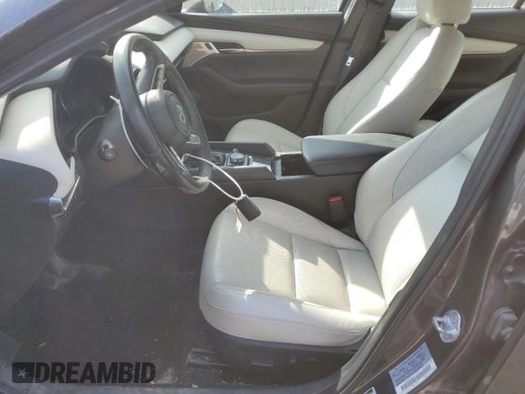 2019 Mazda 3 Premium with VIN JM1BPBEMXK1119599, listed as a Copart auction lot 71036504 with 61,371 mi miles and Salvage Title. Bid and sale history available at DreamBid. Image 7.