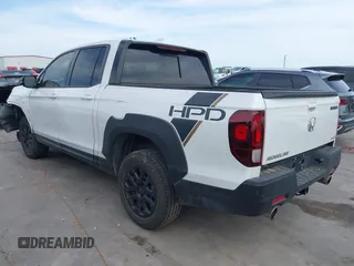2023 Honda Ridgeline Black Edition with VIN 5FPYK3F84PB011792, listed as a IAAI auction lot 42049593 with 21,002 mi miles and . Bid and sale history available at DreamBid. Image 3.