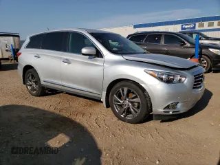 2013 Infiniti JX35 with VIN 5N1AL0MM0DC312554, listed as a Copart auction lot 72746054 with 256,514 mi miles and Salvage Title. Bid and sale history available at carsss.com. Image 4.