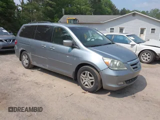 2007 Honda Odyssey EX-L z VIN 5FNRL38667B066105, wystawiony jako IAAI lot #42423562 z przebiegiem 208 918 mil mil oraz . Historia ofert i sprzedaży dostępna na DreamBid. Obrazek 1.