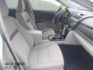 2012 Toyota Camry L z VIN 4T4BF1FK0CR157600, wystawiony jako IAAI lot #42438078 z przebiegiem 94 310 mil mil oraz . Historia ofert i sprzedaży dostępna na DreamBid. Obrazek 5.