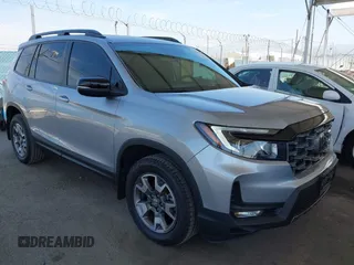 2023 Honda Passport TrailSport with VIN 5FNYF8H61PB028829, listed as a IAAI auction lot 41968490 with 20,090 mi miles. Bid and sale history available at carsss.com. Image 1.